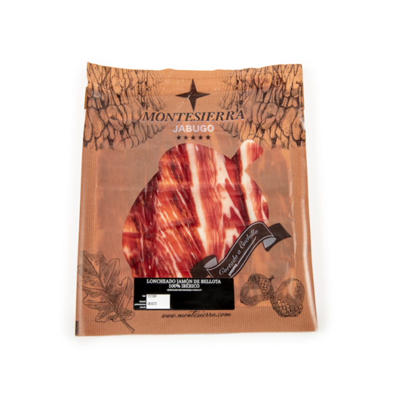 Slices of Acorn fed Iberian Ham Jabugo carved with a knife