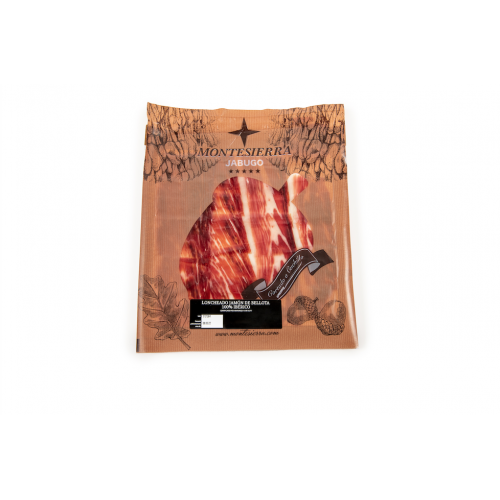 Slices of Acorn fed Iberian Ham Jabugo carved with a knife